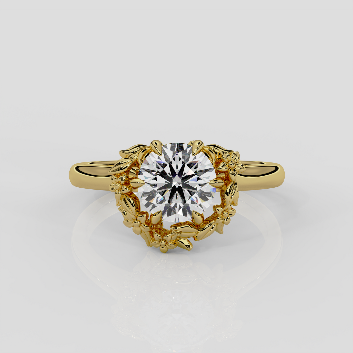 18ct yellow gold halo engagement ring, Blossom by London jewellery designer, Georgina Yvonne. Natured inspired design with round brilliant cut diamond centre 