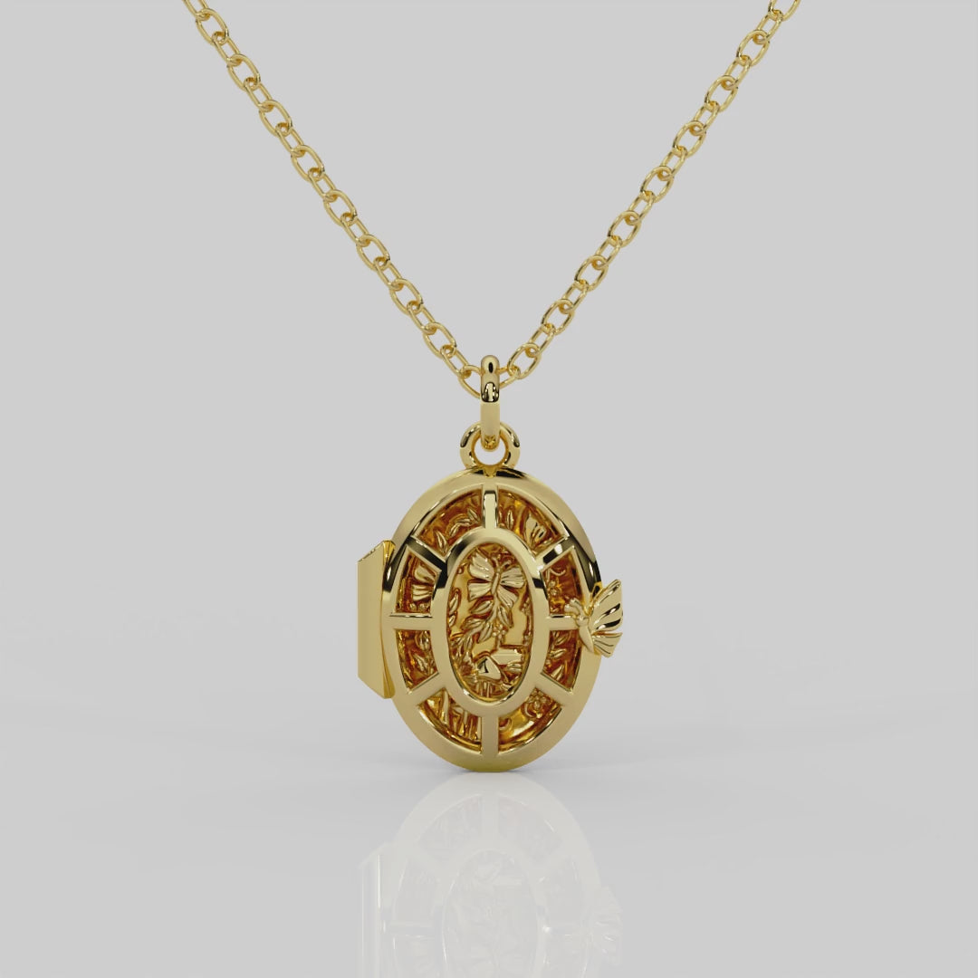 18ct yellow gold Fairytale locket from London jewellery designer, Georgina Yvonne's, award winning Wonderland jewellery collection. With fairytale inspired scene, featuring butterflies, mushrooms, and vines.