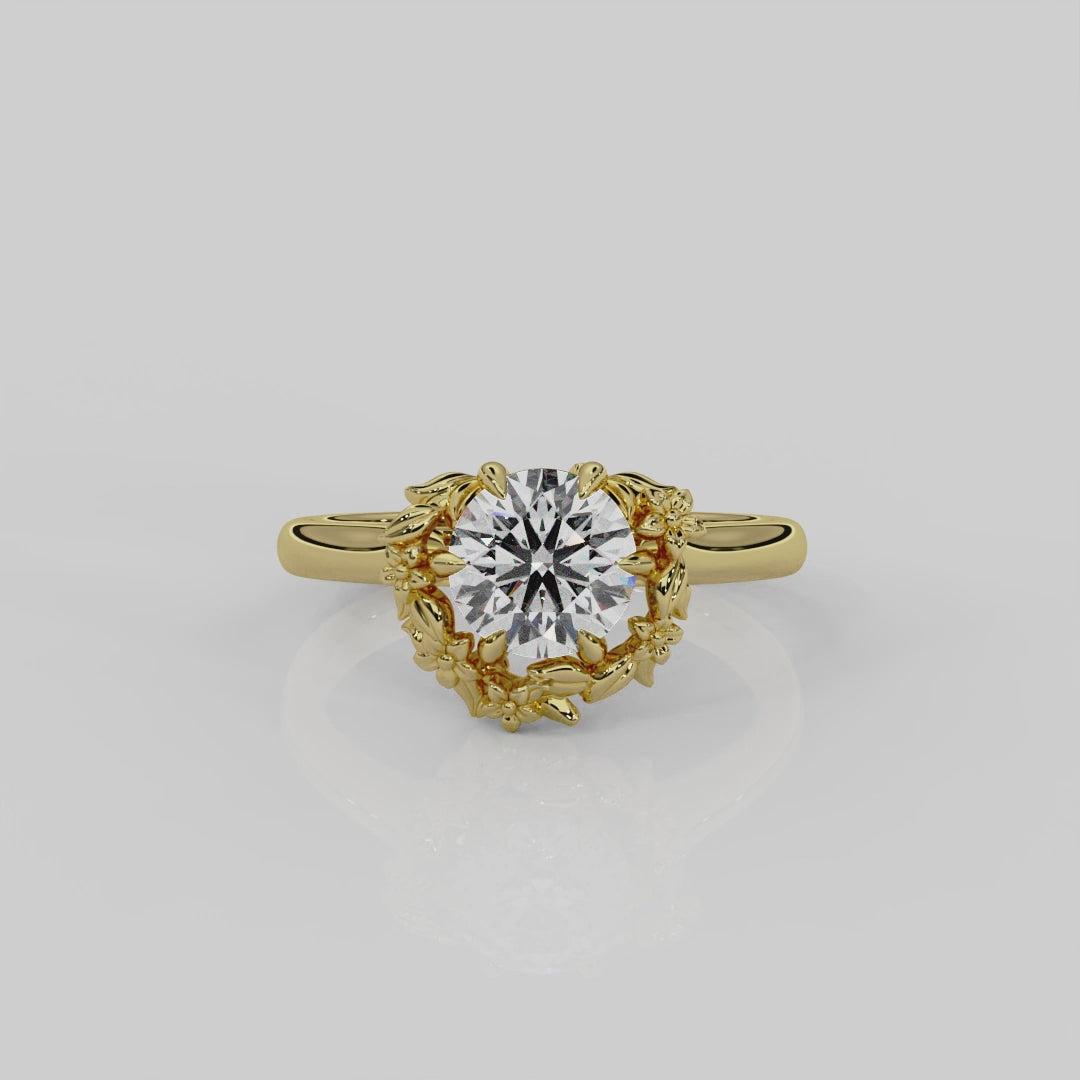 Georgina Yvonne 18ct yellow gold Blossom halo engagement ring. Nature inspired design with round brilliant cut diamond centre